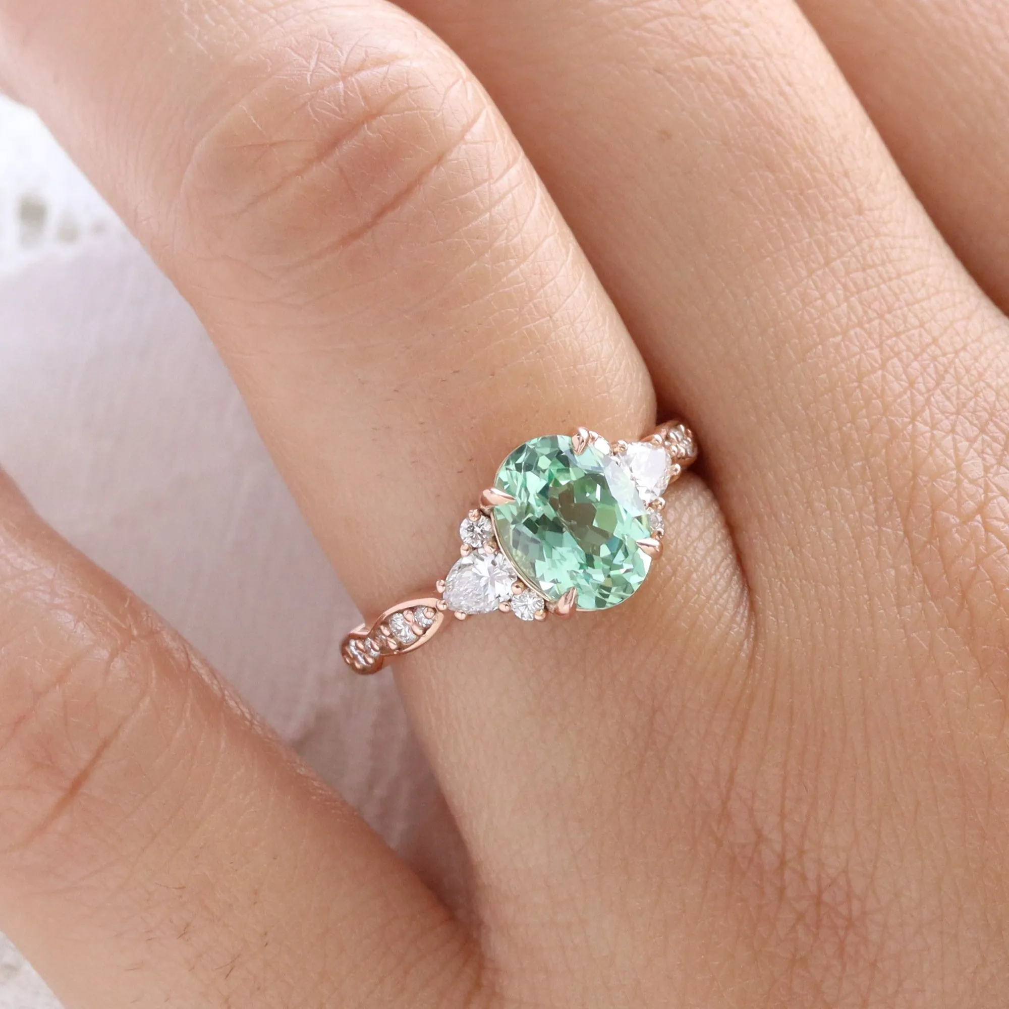 2.85 Ct. Oval Green Sapphire Ring in Dahlia 3 Stone Diamond Band