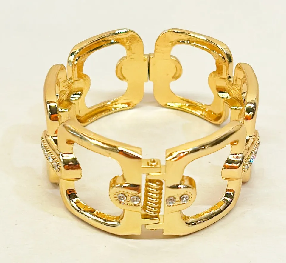 Large thick statement hinged camper style bracelet.