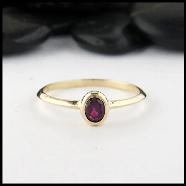 Simple Oval Ruby Ring in Yellow Gold